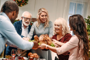 family holding christmas turkey